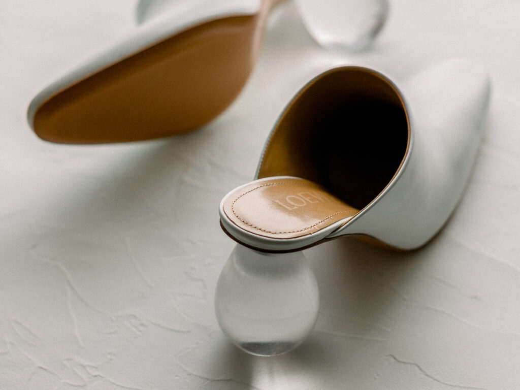 White Loewe Calfskin Bulb Heels on a white background - styling your engagement session in the most perfect way